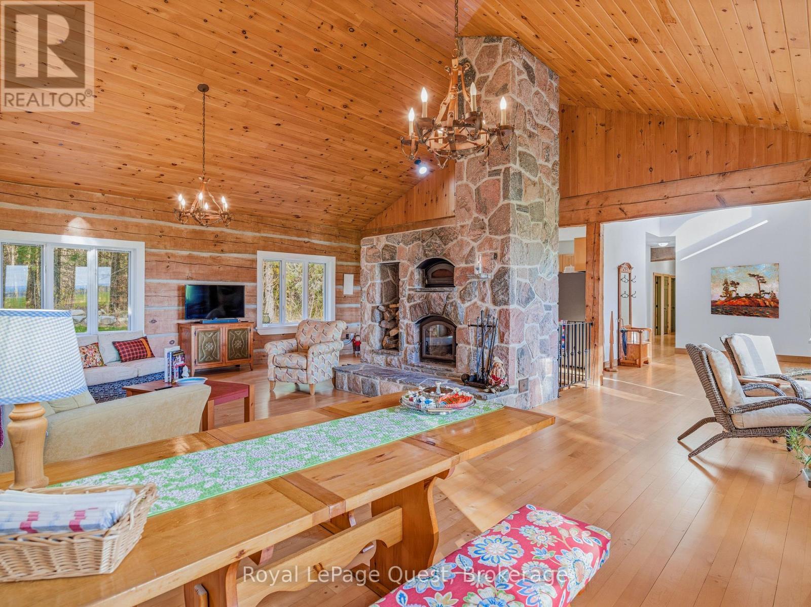 160 14 Concession W, Tiny, ON - Indoor Photo Showing Living Room With Fireplace