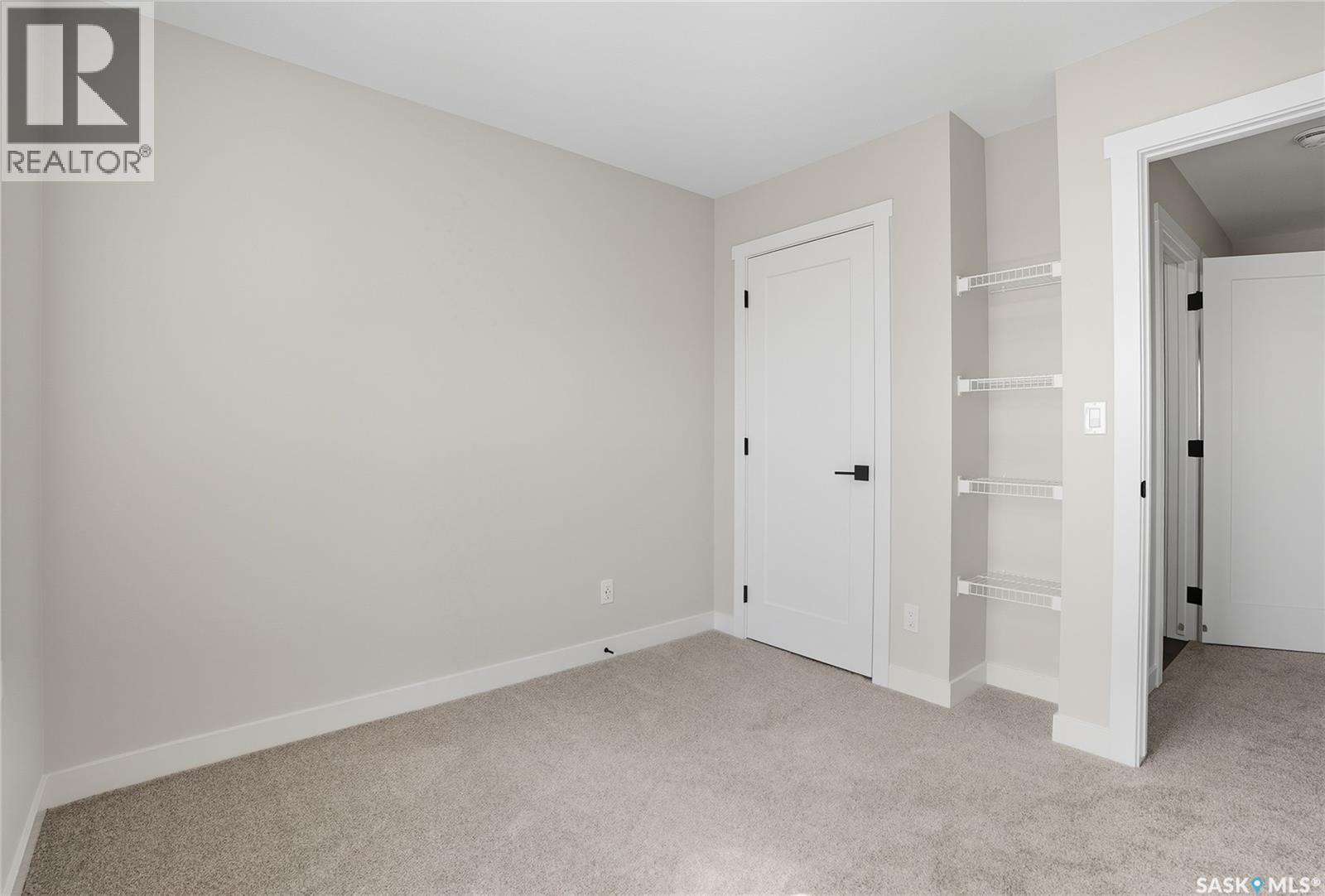 42 Taskamanwa Terrace, Saskatoon, SK - Indoor Photo Showing Other Room