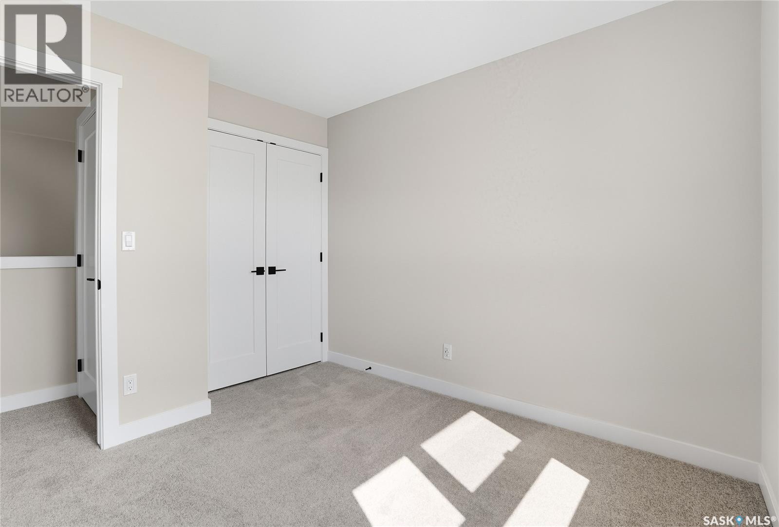 42 Taskamanwa Terrace, Saskatoon, SK - Indoor Photo Showing Other Room