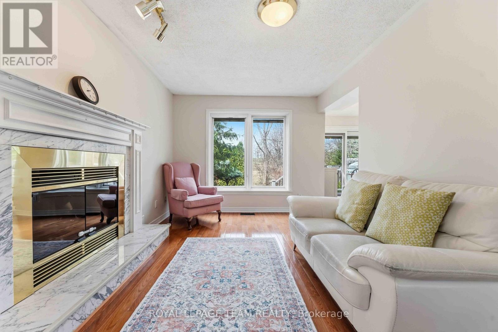 86 Sai Crescent, Ottawa, ON - Indoor Photo Showing Living Room With Fireplace