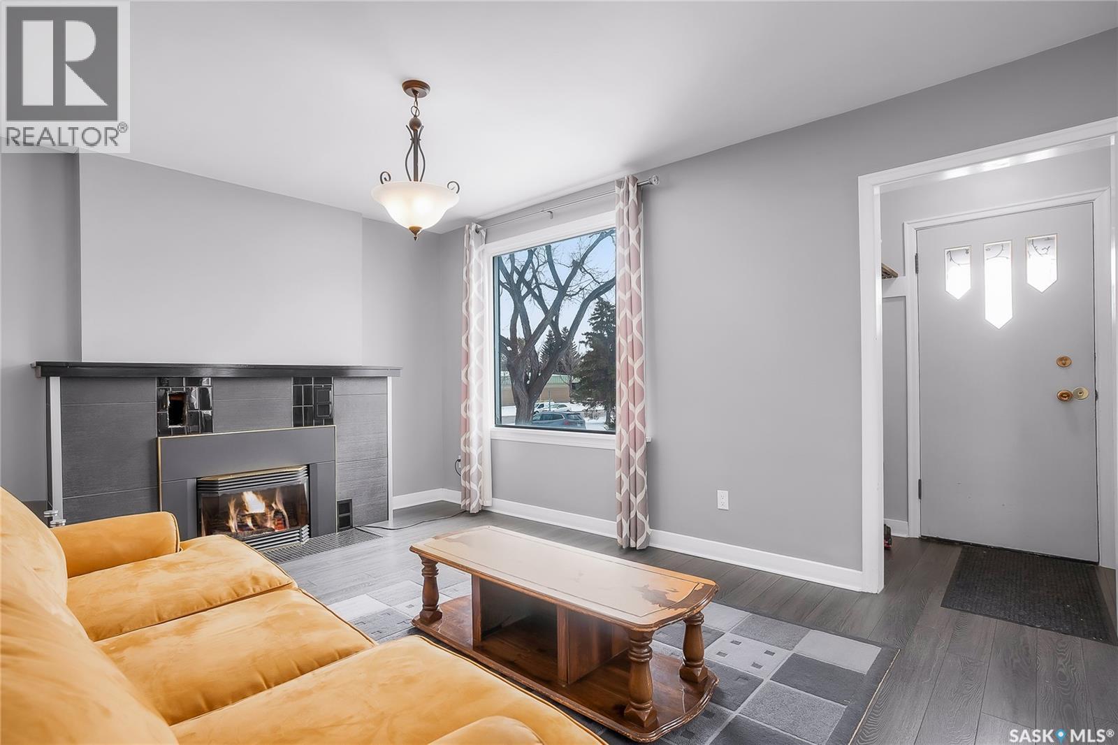 1231 Aird Street, Saskatoon, SK - Indoor Photo Showing Living Room With Fireplace