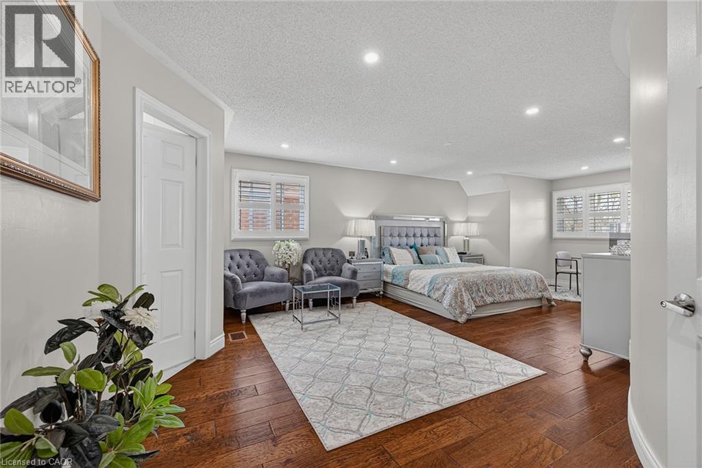 Spacious interior featuring wood-finish flooring, recessed lighting, and crown molding - 79 Holbrook Crescent, Cambridge, ON - Indoor Photo Showing Bedroom