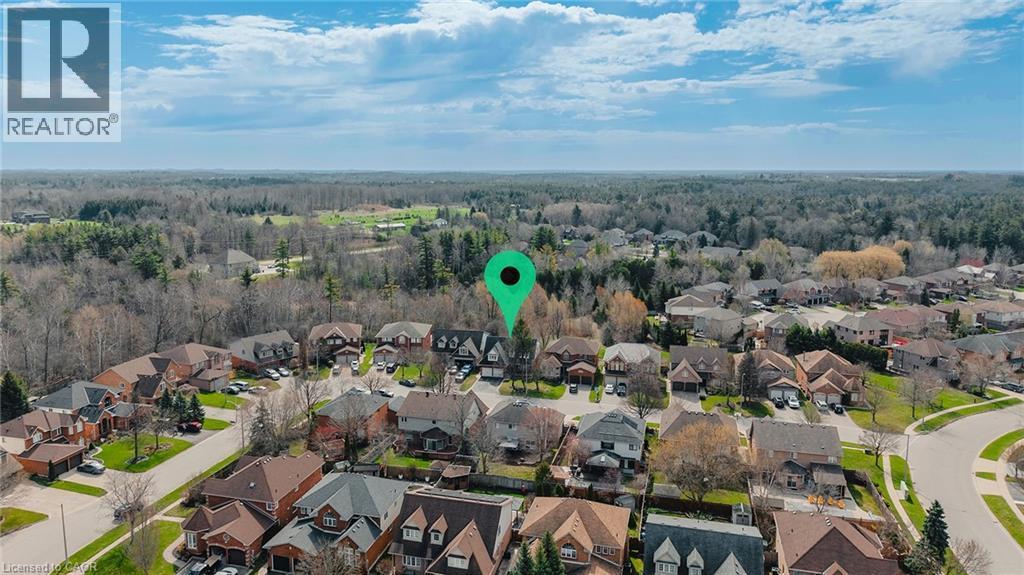 Aerial perspective highlighting a residential community with varied architectural styles and mature landscaping - 79 Holbrook Crescent, Cambridge, ON - Outdoor With View