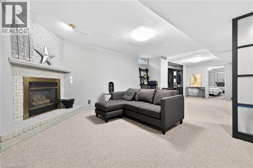 22 Novoco Drive, Hamilton, ON - Indoor Photo Showing Living Room With Fireplace