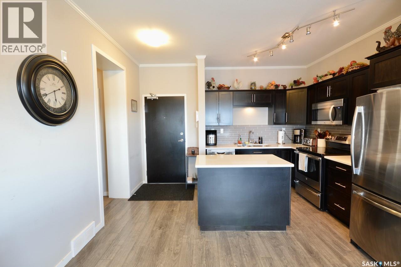 321 545 Hassard Close, Saskatoon, SK - Indoor Photo Showing Kitchen With Upgraded Kitchen