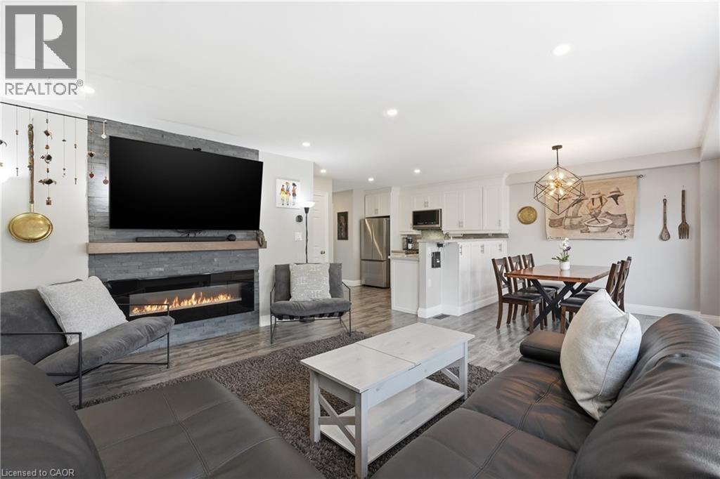 3 Rembe Avenue, Hamilton, ON - Indoor Photo Showing Living Room With Fireplace