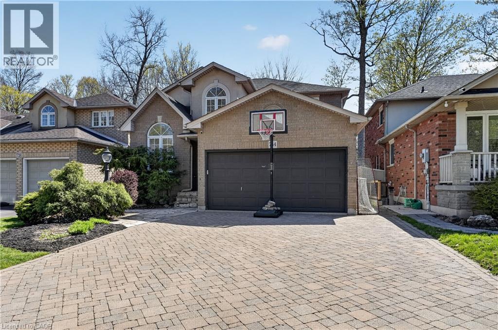 Double wide interlocking stone driveway - 734 Brigadoon Drive, Hamilton, ON - Outdoor With Facade