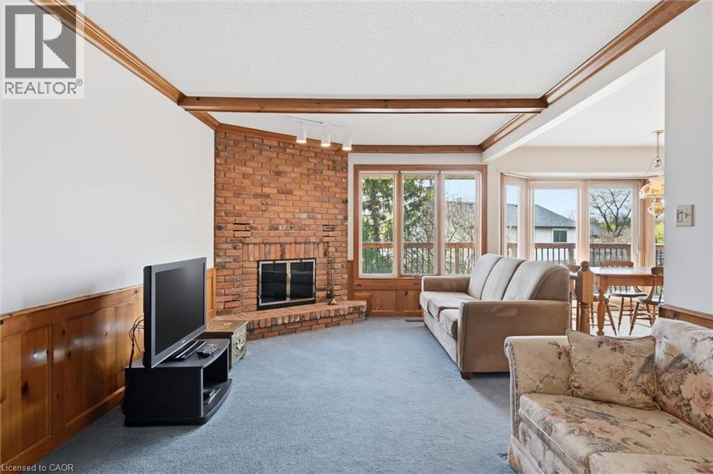 2018 Barlow Crescent, Burlington, ON - Indoor Photo Showing Living Room With Fireplace