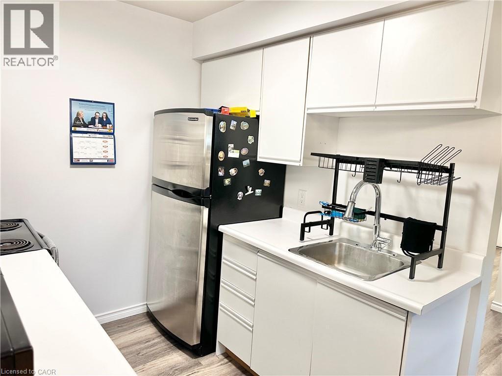 One side of the kitchen - 60 Donly Drive S Unit# 101, Simcoe, ON - Indoor