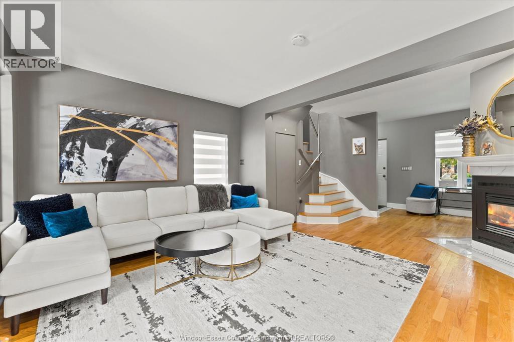 859 Monmouth, Windsor, ON - Indoor Photo Showing Living Room With Fireplace