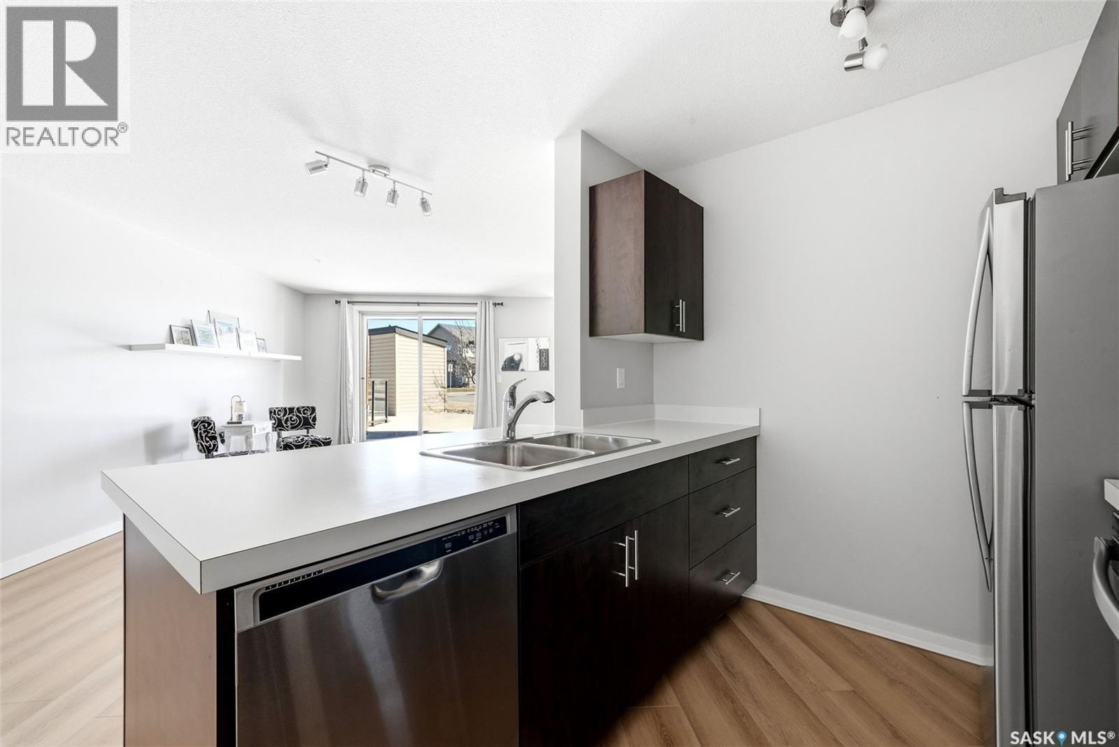 1115 5500 Mitchinson Way, Regina, SK - Indoor Photo Showing Kitchen With Double Sink