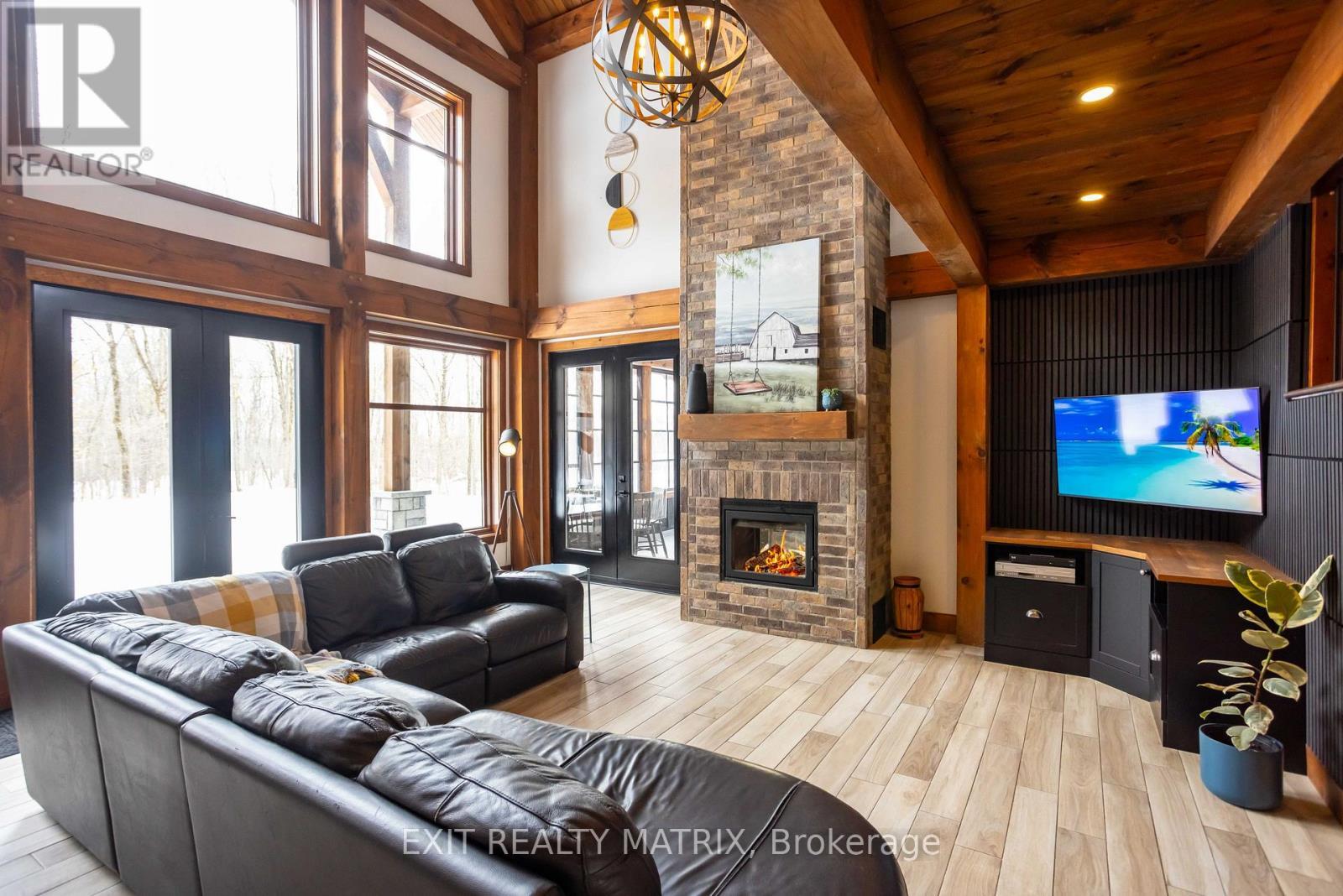 2191 Cassburn Road, Champlain, ON - Indoor Photo Showing Living Room With Fireplace