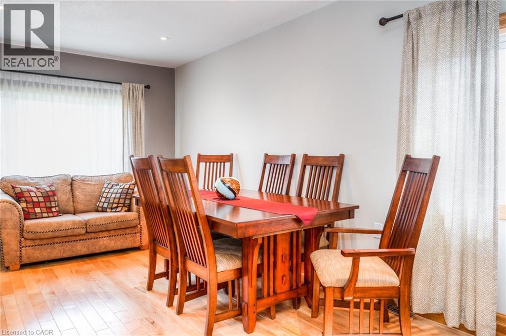 Wood-finish flooring throughout - 46 2 Avenue, Kitchener, ON - Indoor Photo Showing Dining Room