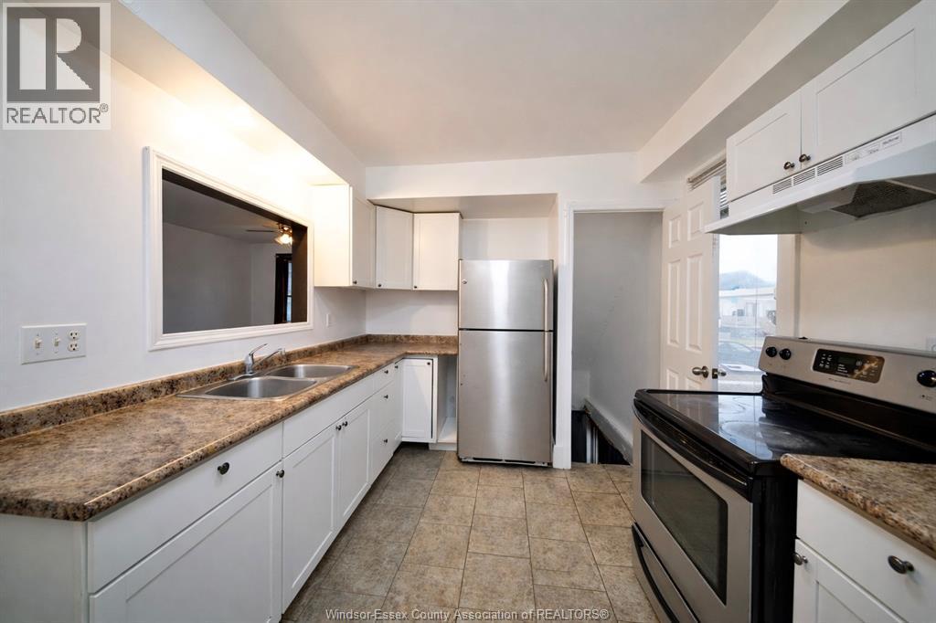 3463 Harris Street, Windsor, ON - Indoor Photo Showing Kitchen With Double Sink