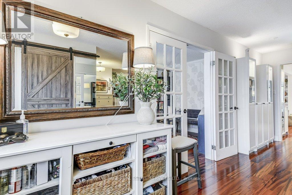 French doors to Living Room - 1279 Old English Lane, Oakville, ON - Indoor Photo Showing Other Room
