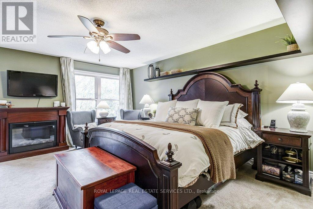 Primary Bedroom - 1279 Old English Lane, Oakville, ON - Indoor Photo Showing Bedroom With Fireplace