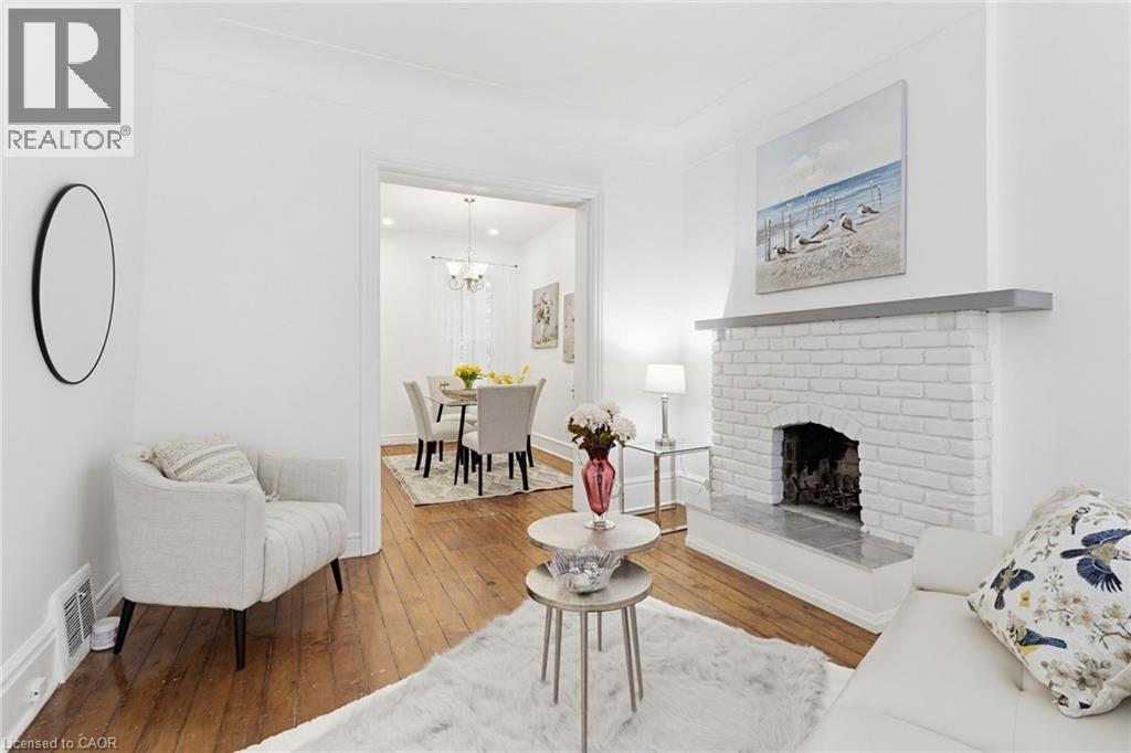 42 Erie Avenue, Hamilton, ON - Indoor Photo Showing Living Room With Fireplace