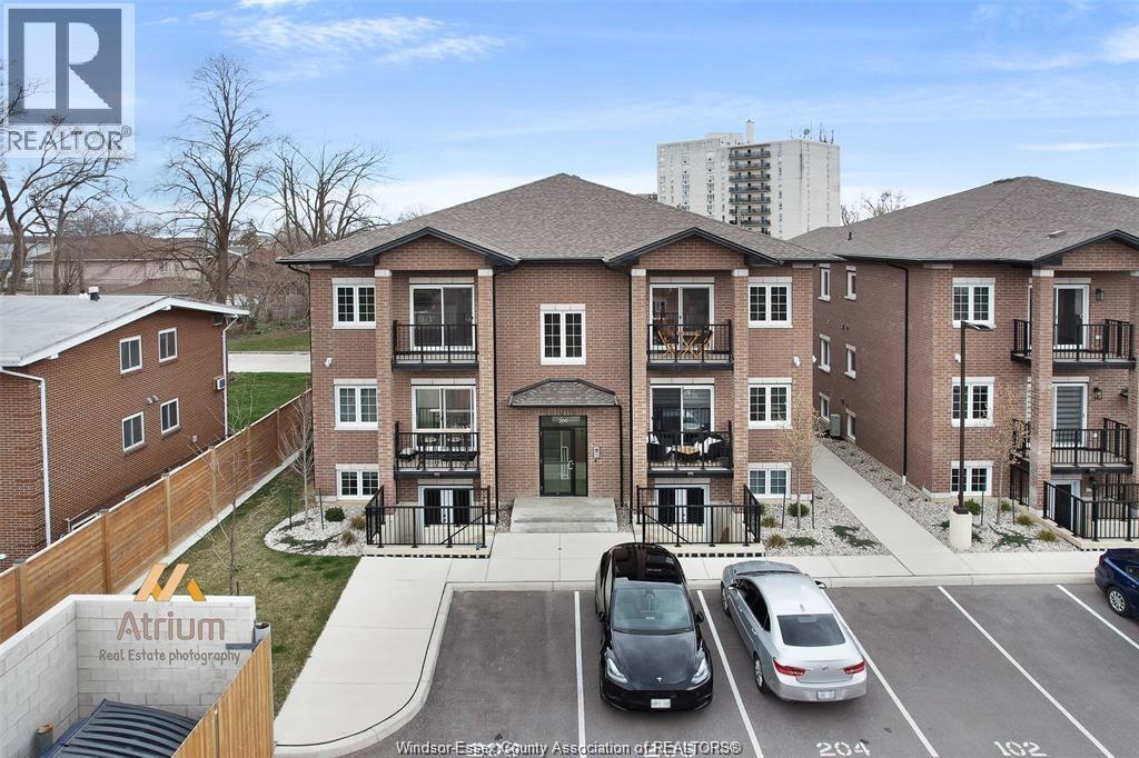 233 Watson Unit# 201, Windsor, ON - Outdoor With Facade