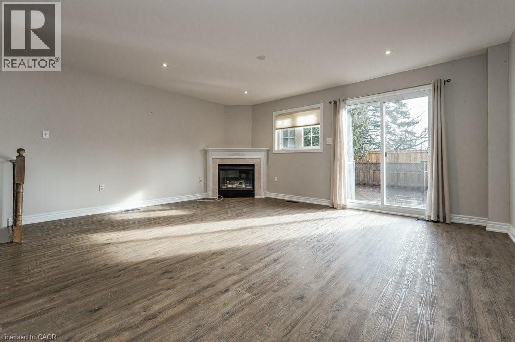 3542 Fowler Court, Burlington, ON - Indoor Photo Showing Living Room With Fireplace
