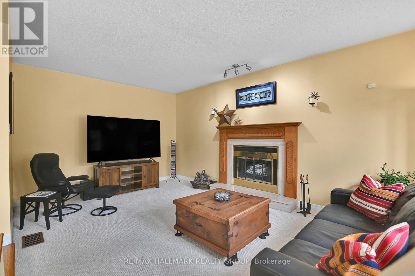 Main Level - Family Room - 21 Hime Crescent, Ottawa, ON - Indoor Photo Showing Living Room With Fireplace