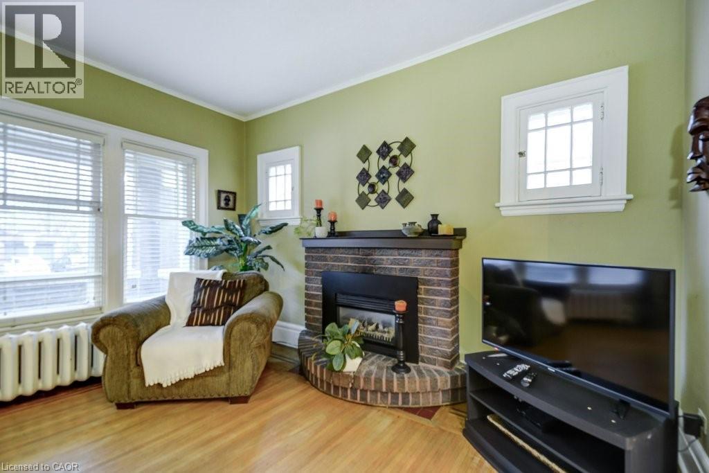 46 Sherman Avenue S, Hamilton, ON - Indoor Photo Showing Living Room With Fireplace