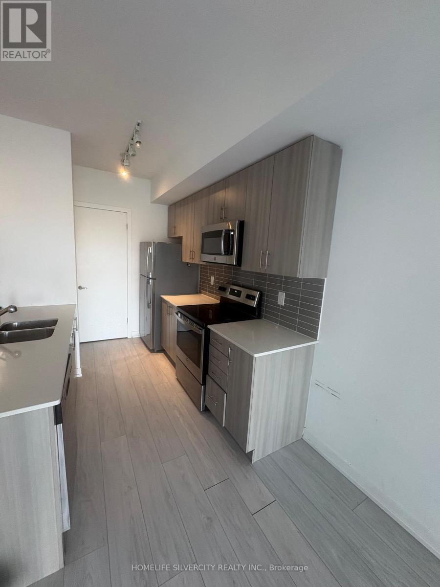 312 - 550 North Service Road, Grimsby, ON - Indoor Photo Showing Kitchen With Stainless Steel Kitchen With Double Sink