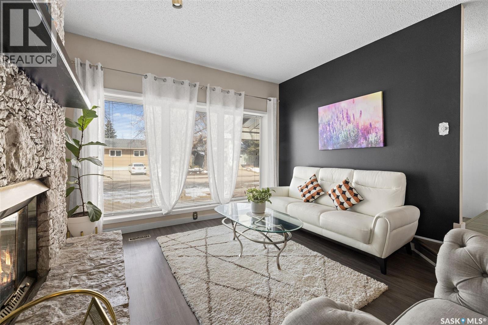 435 Christopher Road, Saskatoon, SK - Indoor Photo Showing Living Room With Fireplace