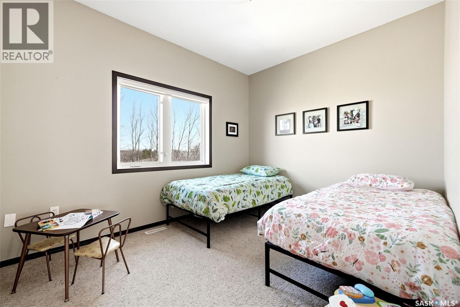 24 Bardel Crescent, Pilot Butte, SK - Indoor Photo Showing Bedroom
