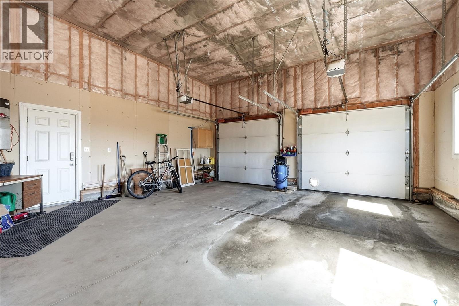 24 Bardel Crescent, Pilot Butte, SK - Indoor Photo Showing Garage