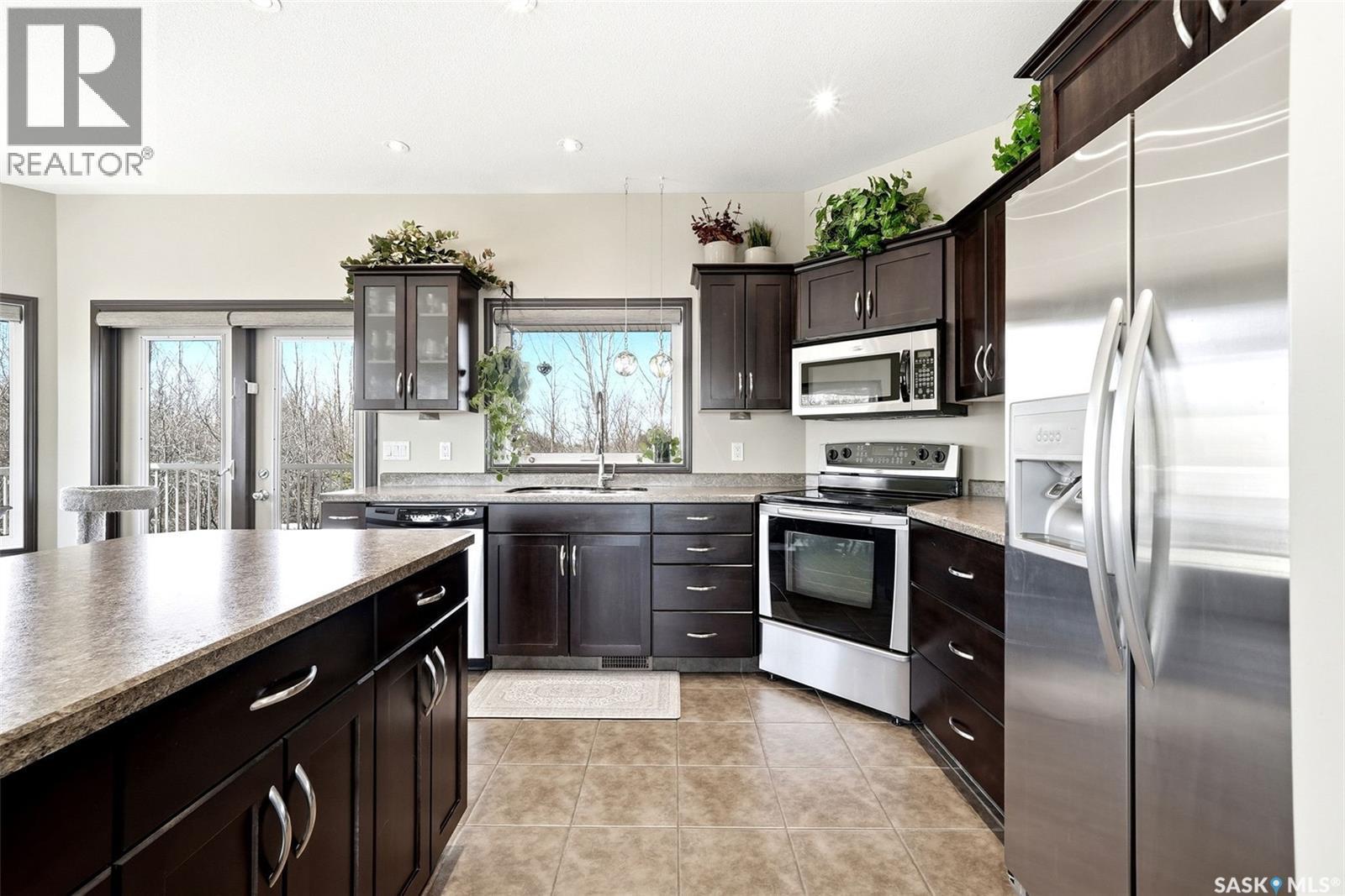 24 Bardel Crescent, Pilot Butte, SK - Indoor Photo Showing Kitchen With Upgraded Kitchen