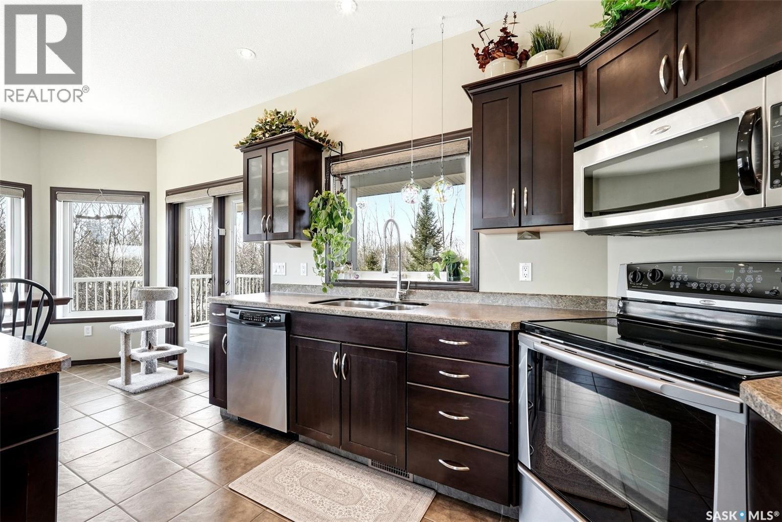 24 Bardel Crescent, Pilot Butte, SK - Indoor Photo Showing Kitchen With Double Sink