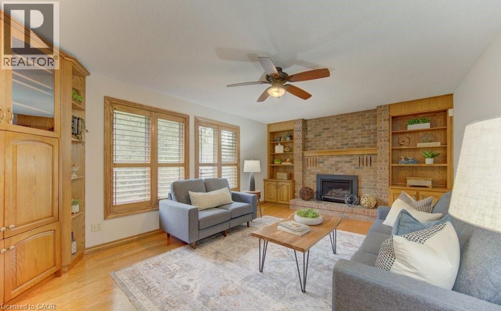 333 Calvington Place, Waterloo, ON - Indoor Photo Showing Living Room With Fireplace