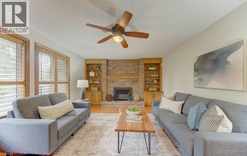 333 Calvington Place, Waterloo, ON - Indoor Photo Showing Living Room With Fireplace