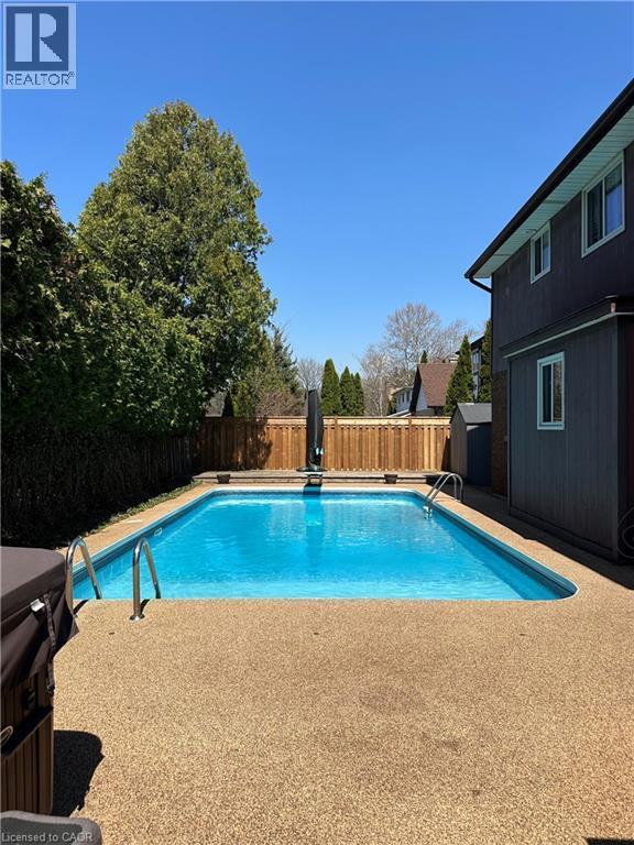 Inground Pool with privacy - 668 Tomahawk Crescent, Ancaster, ON - Outdoor With In Ground Pool With Backyard