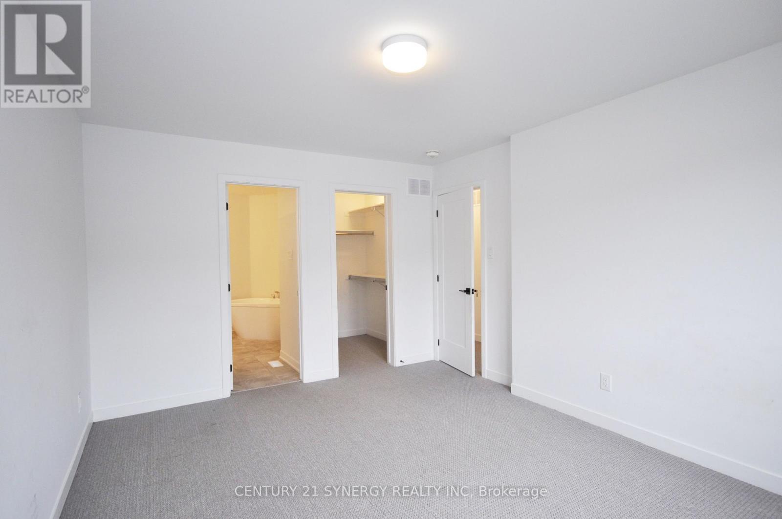 Primary bedroom with walk-in closet & ensuite - 284 Ormiston Crescent, Ottawa, ON - Indoor Photo Showing Other Room