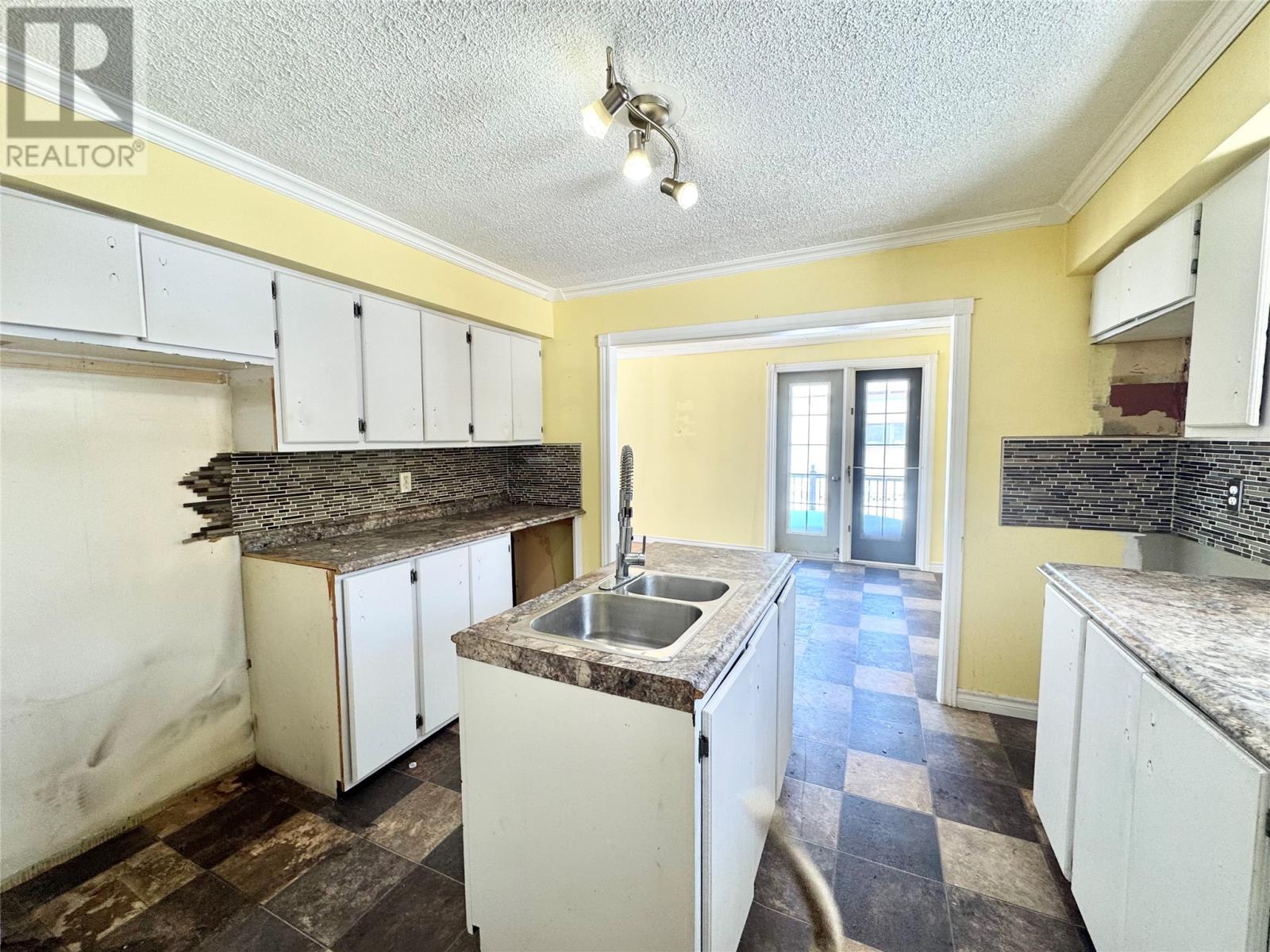 4A Hulls Lane, Twillingate, NL - Indoor Photo Showing Kitchen With Double Sink