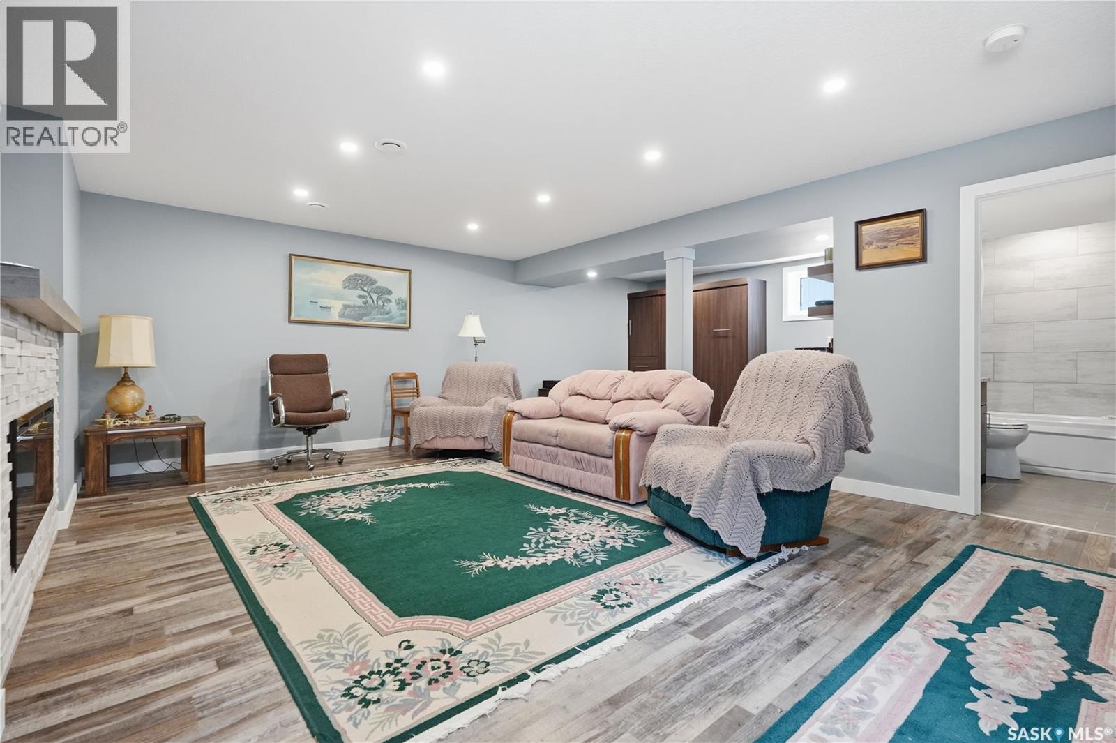 4009 Alton Crescent, Regina, SK - Indoor Photo Showing Other Room With Fireplace