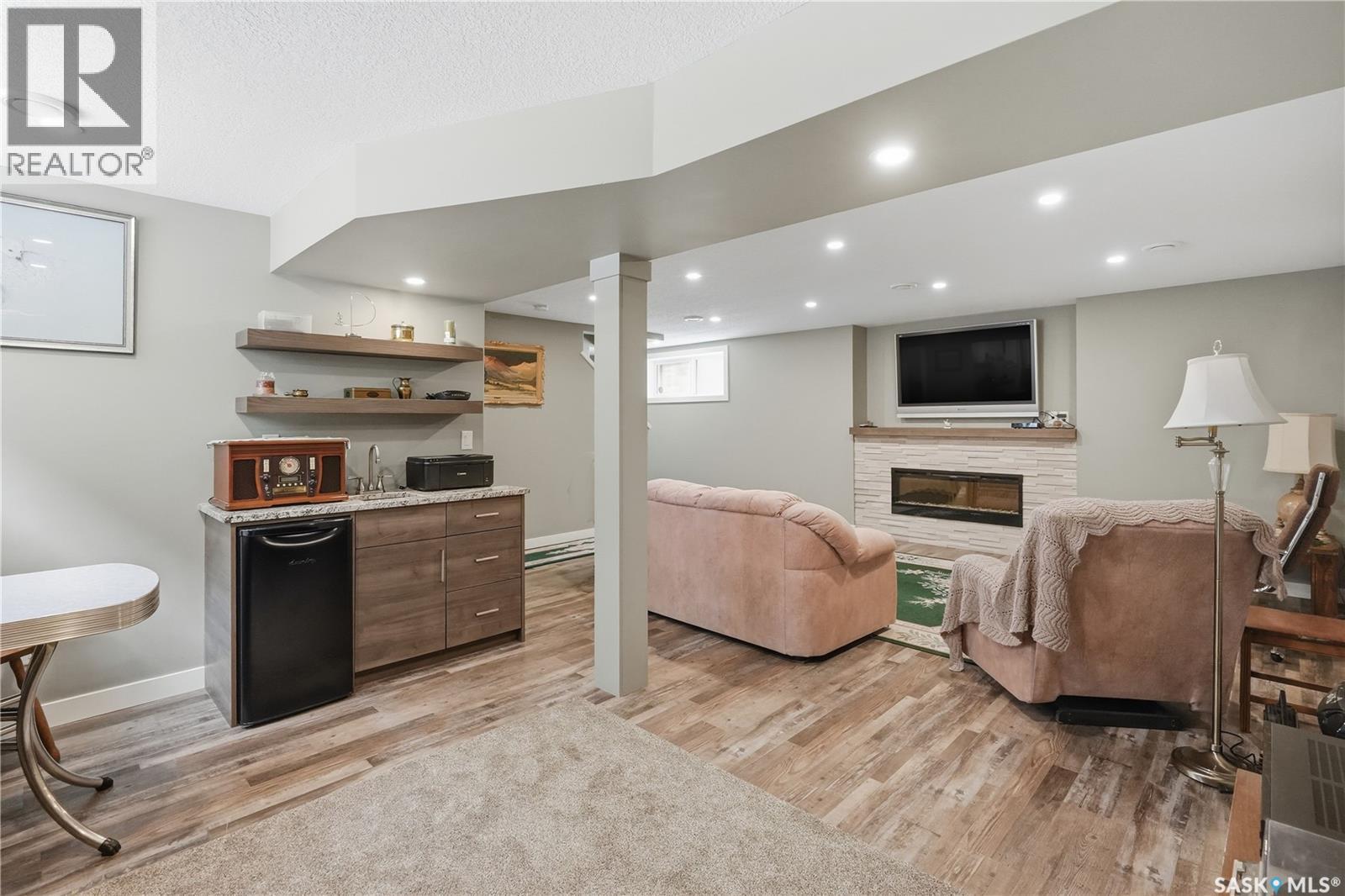 4009 Alton Crescent, Regina, SK - Indoor With Fireplace