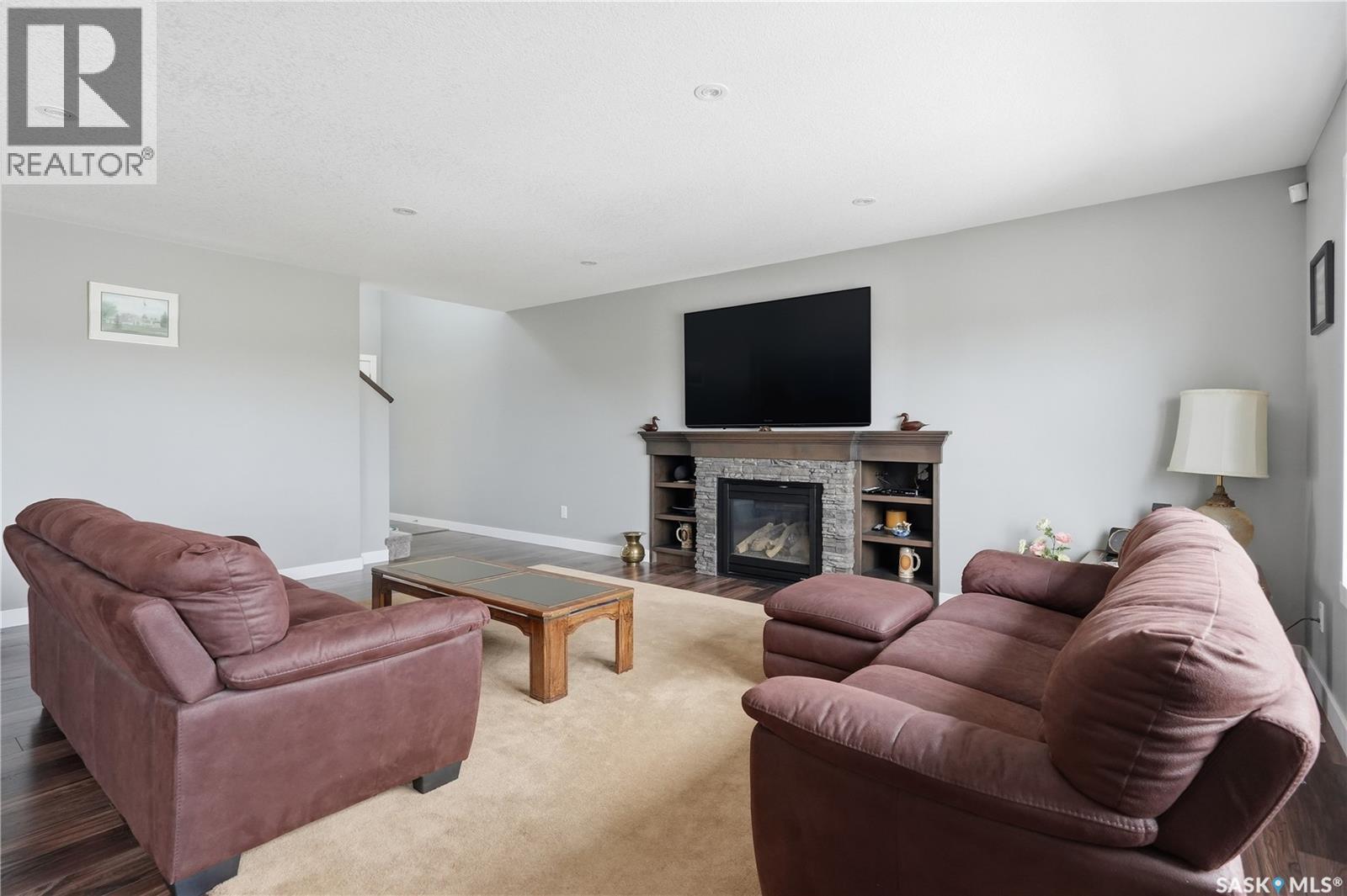 4009 Alton Crescent, Regina, SK - Indoor Photo Showing Living Room With Fireplace
