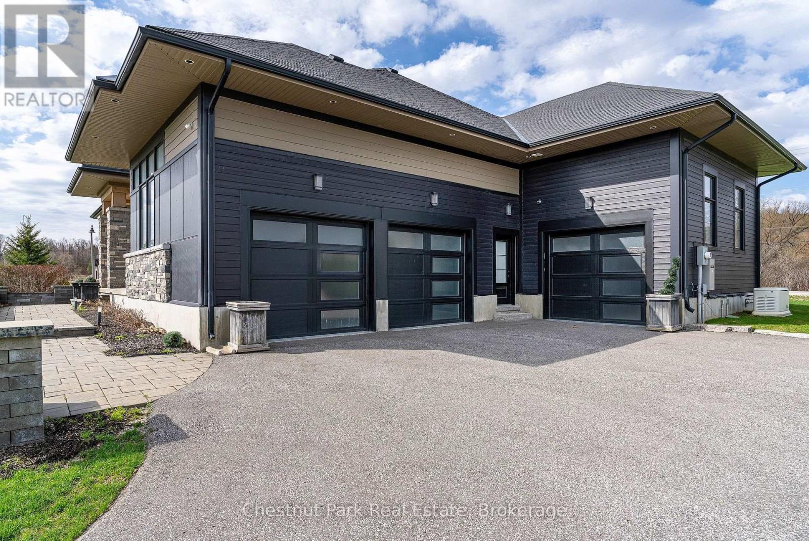 3 car attached garage with inside entry to house - 1 Windrose Valley Boulevard, Clearview, ON - Outdoor