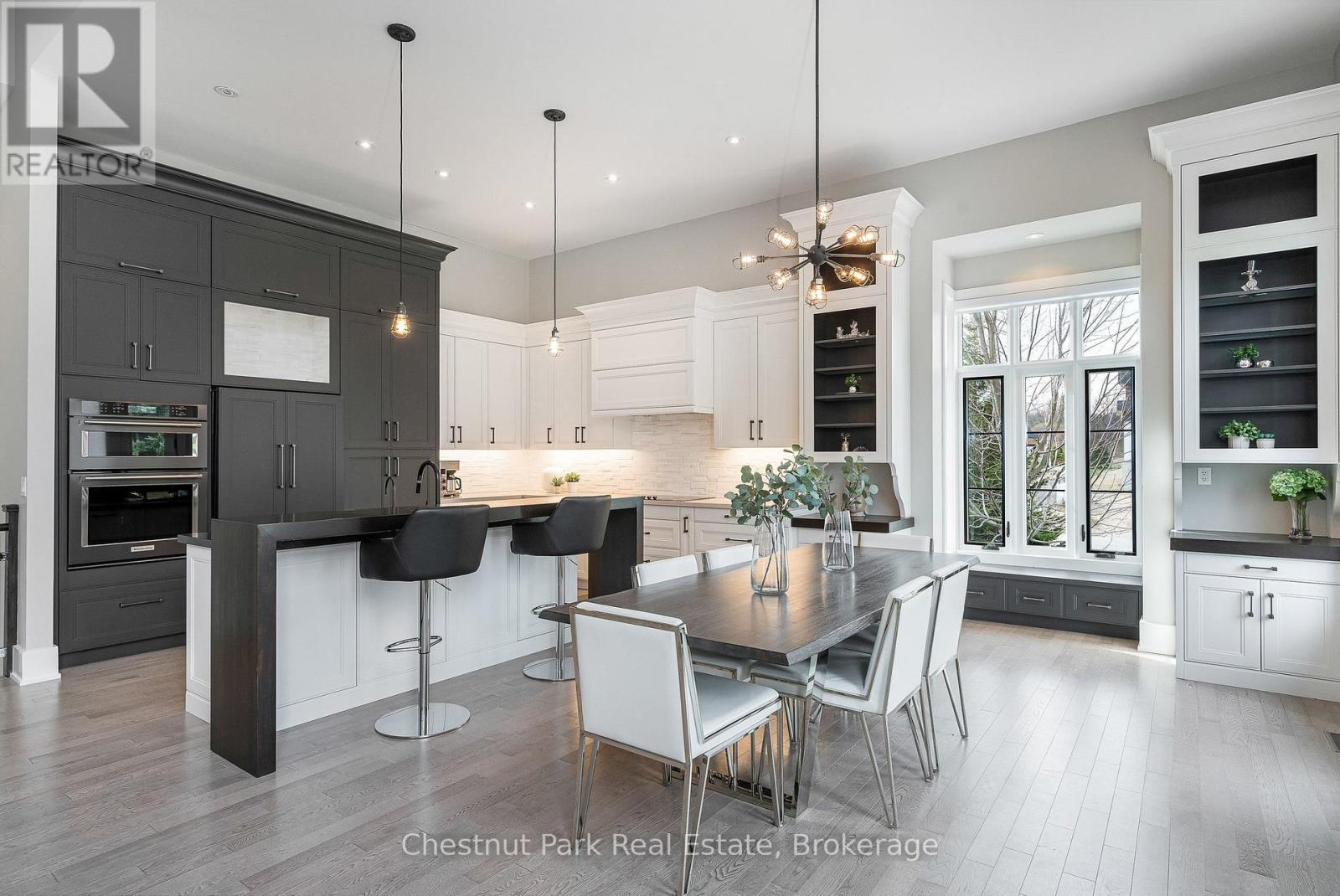 Open floor plan kitchen and dining area - 1 Windrose Valley Boulevard, Clearview, ON - Indoor