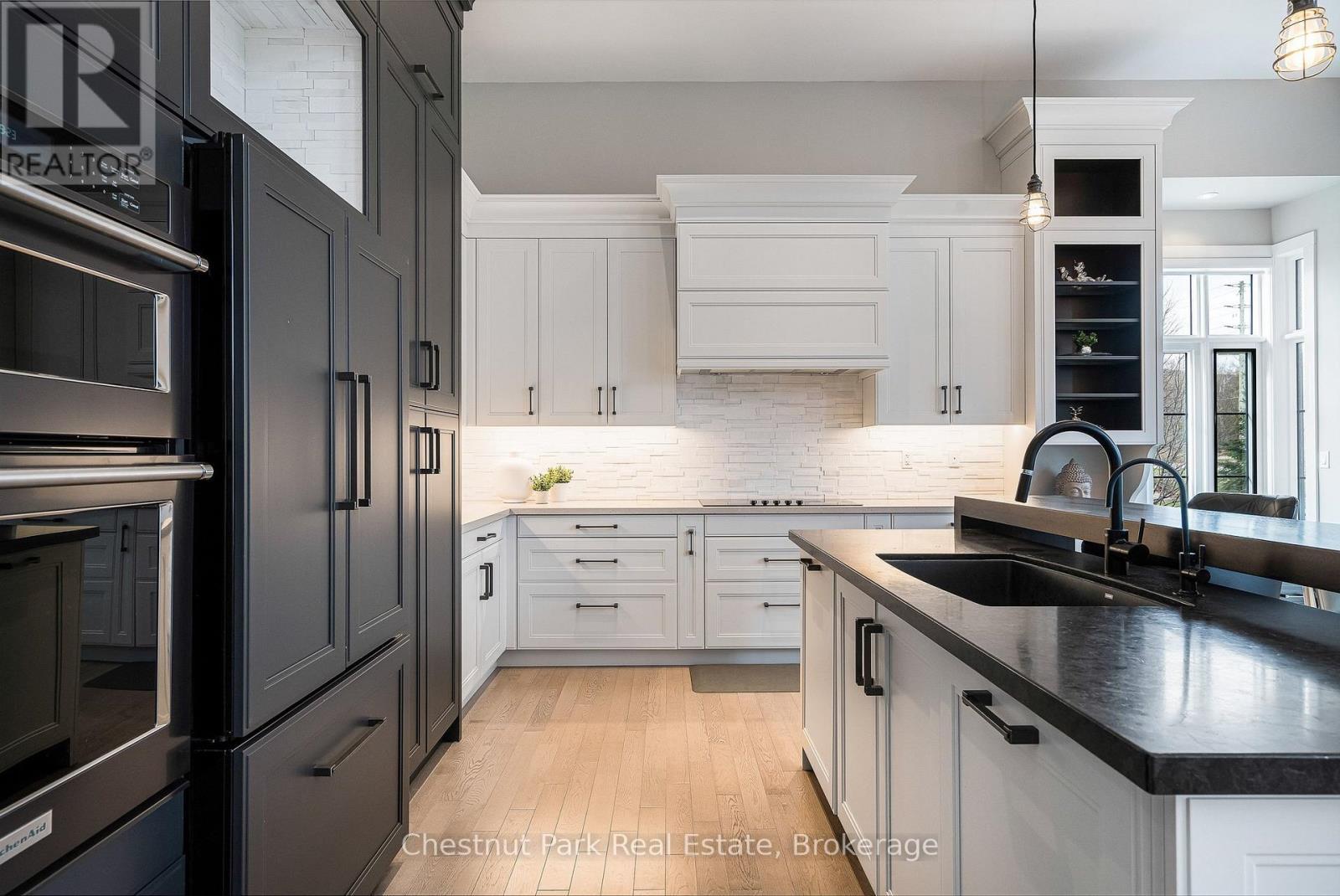 Plenty of cupboard space and custom cabinetry - 1 Windrose Valley Boulevard, Clearview, ON - Indoor Photo Showing Kitchen With Upgraded Kitchen