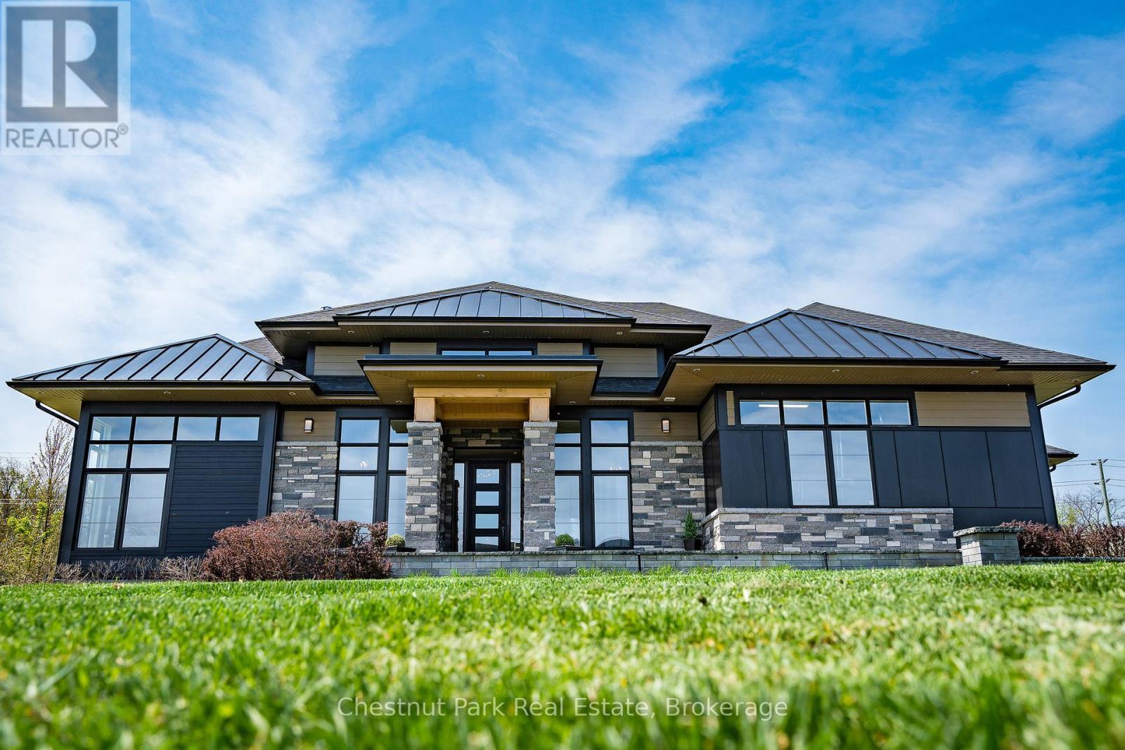 Impressive front entrance - inground sprinklers - 1 Windrose Valley Boulevard, Clearview, ON - Outdoor With Facade