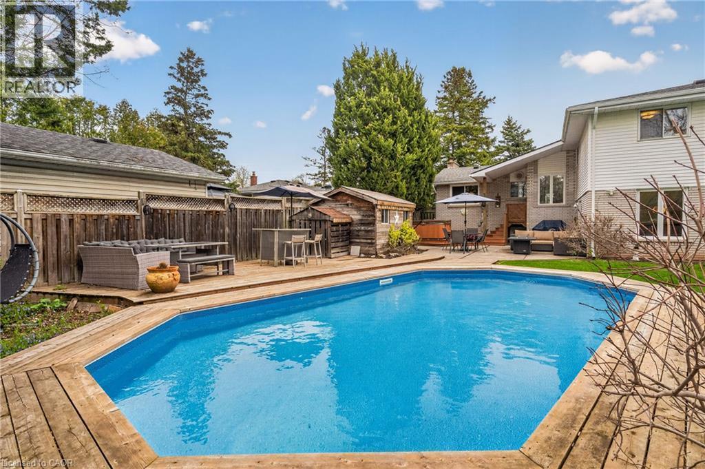 5119 Cherryhill Crescent, Burlington, ON - Outdoor With In Ground Pool With Deck Patio Veranda With Backyard