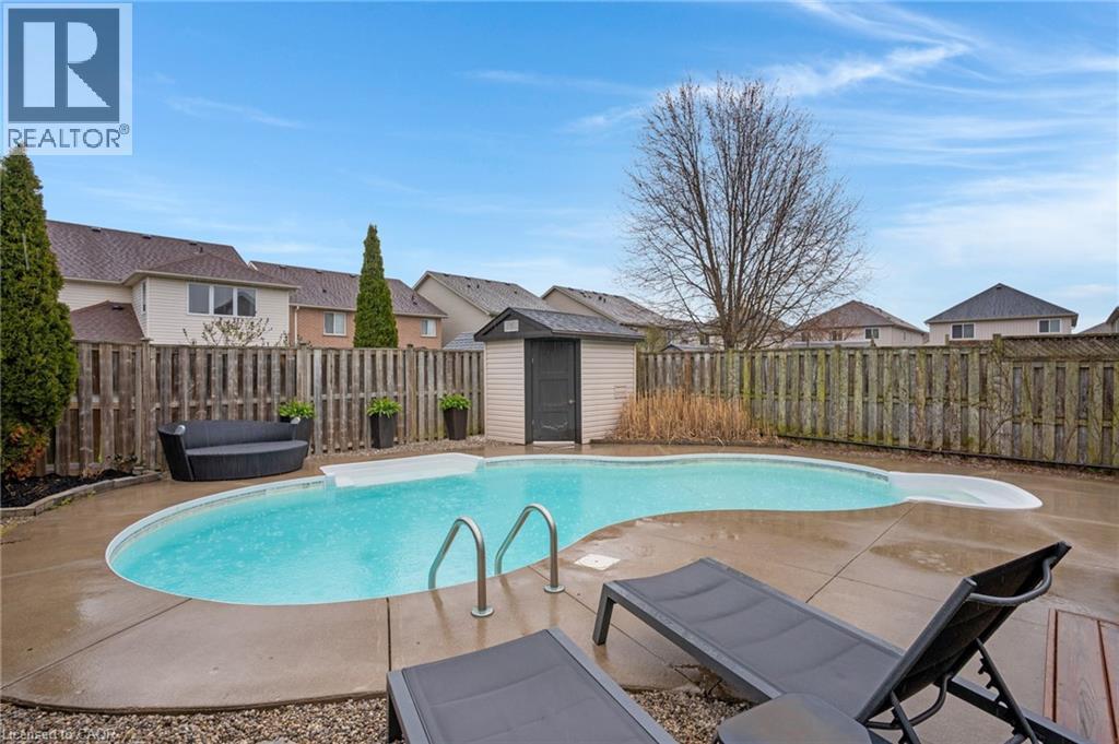 99 Udvari Crescent, Kitchener, ON - Outdoor With In Ground Pool