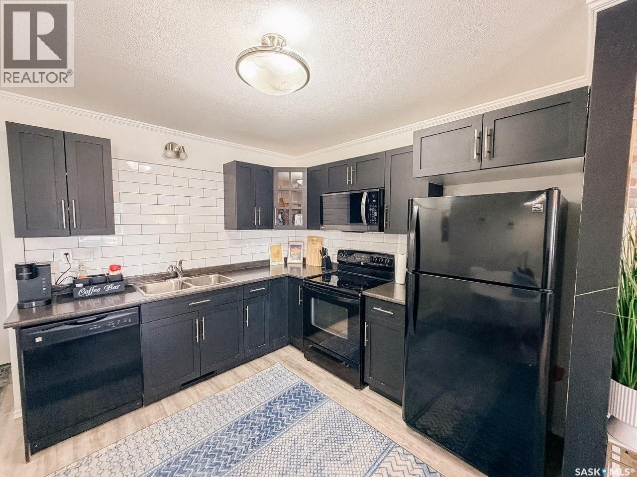509 1303 Richardson Road, Saskatoon, SK - Indoor Photo Showing Kitchen With Double Sink