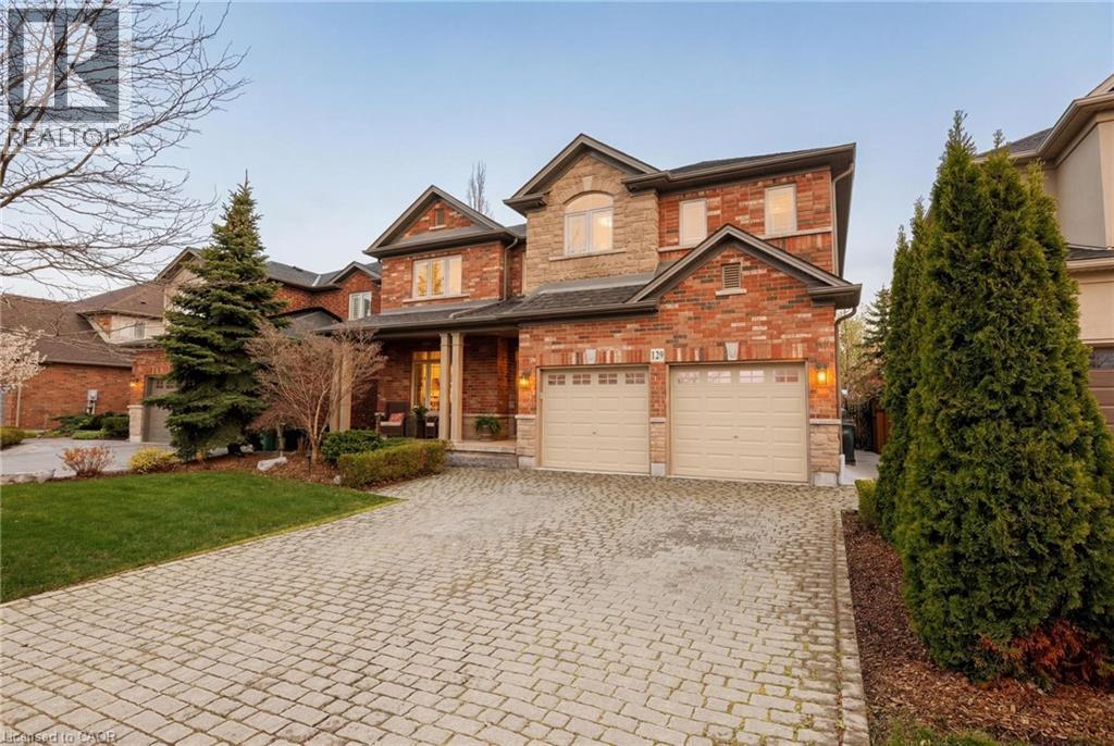 Brick and stone façade residence with a two-car garage - 129 Magnificent Way, Binbrook, ON - Outdoor
