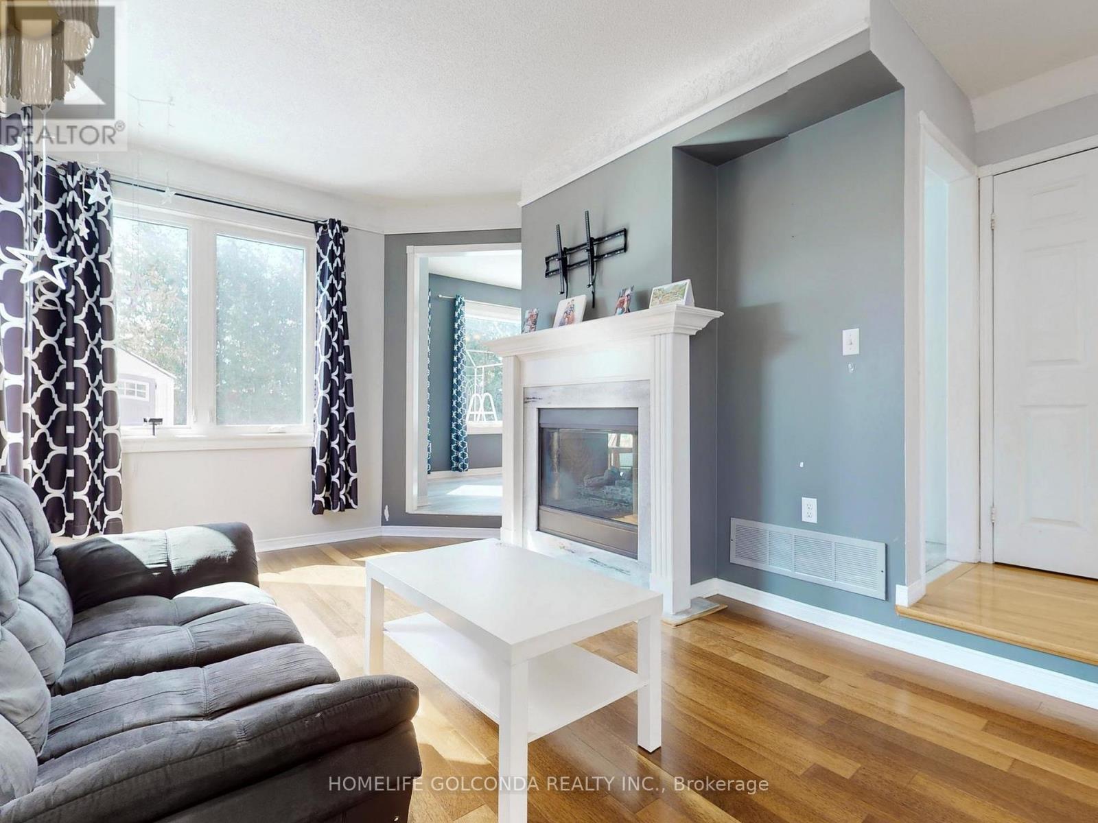 39 Etherington Crescent, Barrie, ON - Indoor Photo Showing Living Room With Fireplace