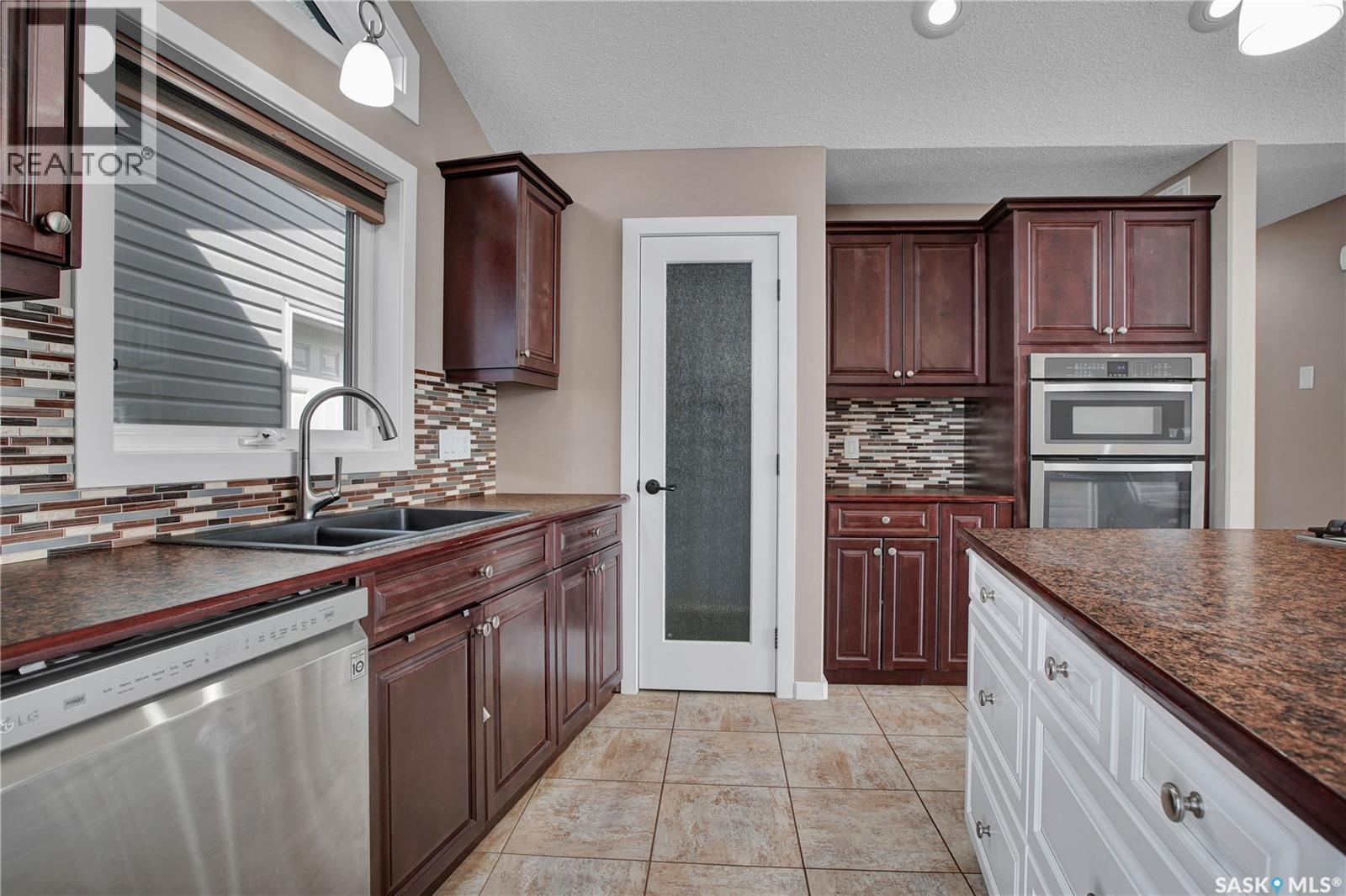 48 Mawson Drive, Shields, SK - Indoor Photo Showing Kitchen With Double Sink