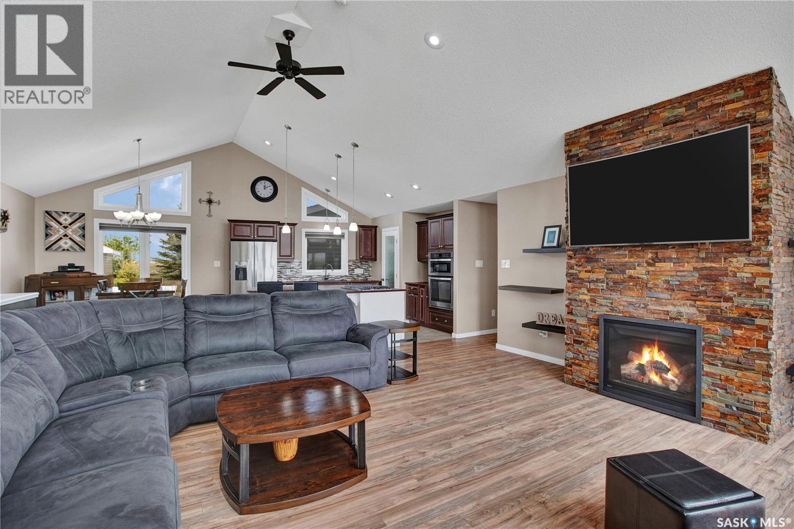 48 Mawson Drive, Shields, SK - Indoor Photo Showing Living Room With Fireplace